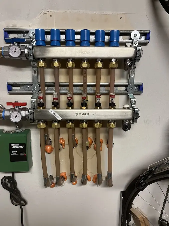 Plumber performing Water Heater Repair at a residential property in Three Points