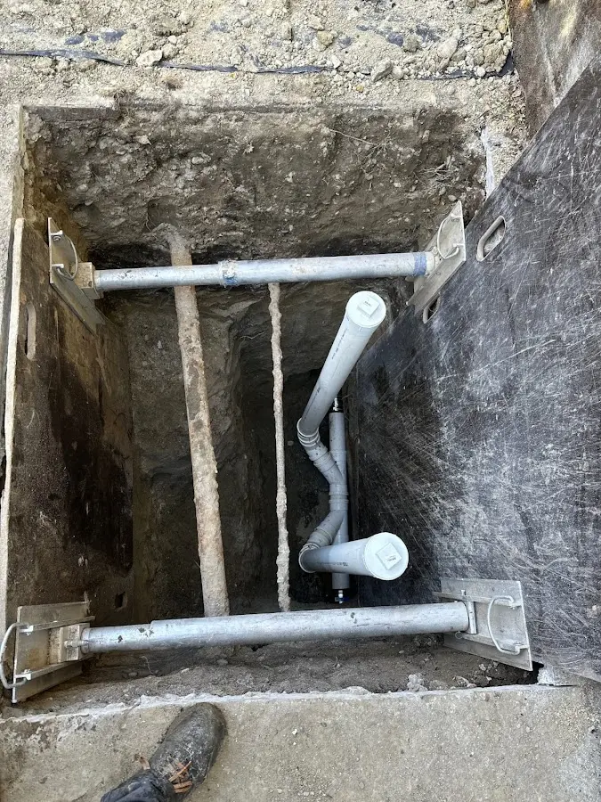 Experienced plumber completing Drain Cleaning work in Three Points